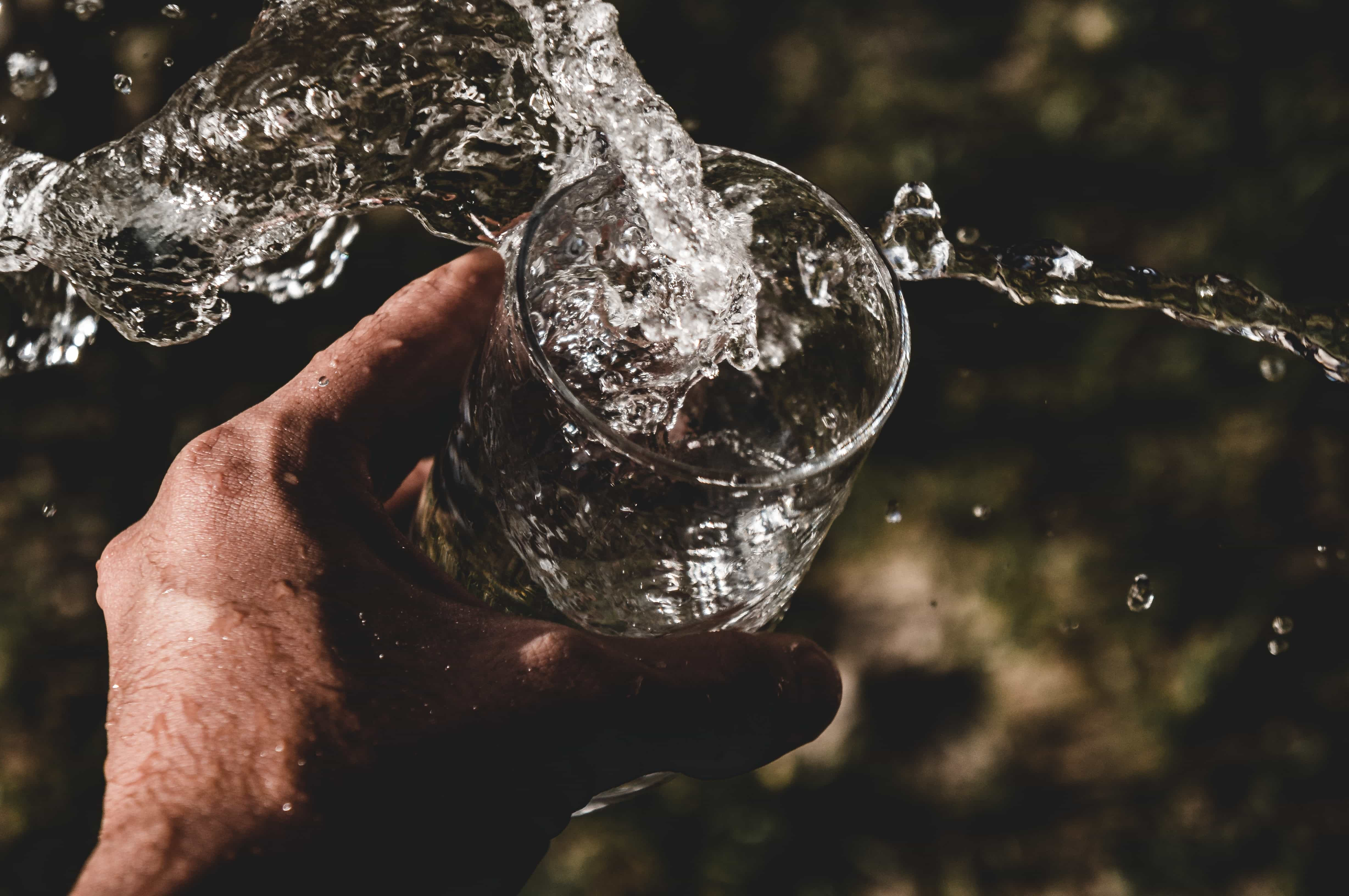 water splashing into a glass